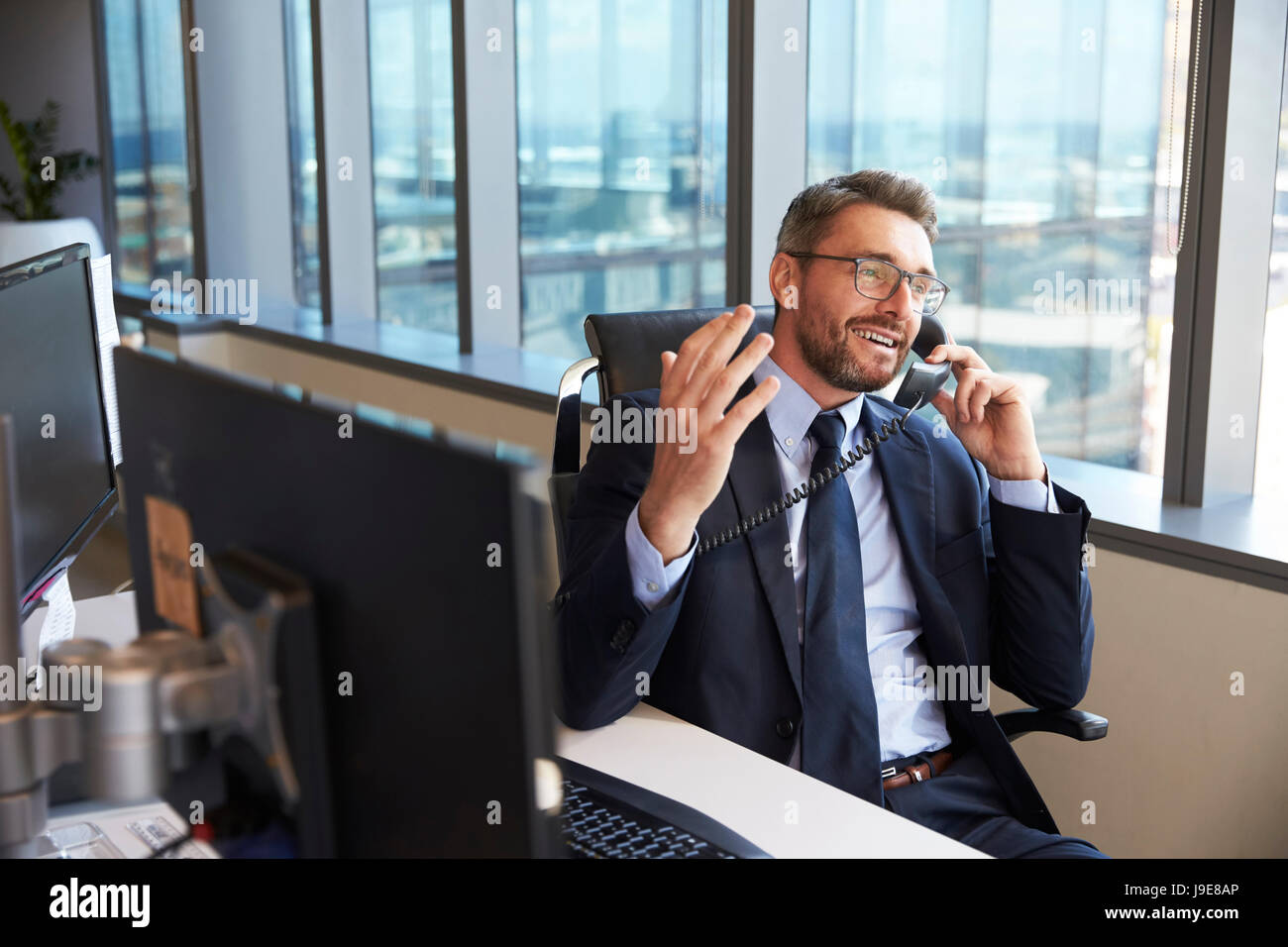 Customer support executive assisting clients with car rental bookings